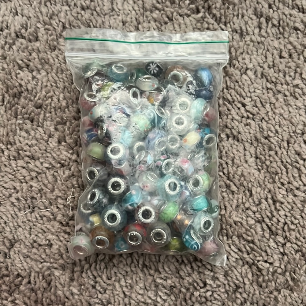 Bag of pandora charms (around 75-100)